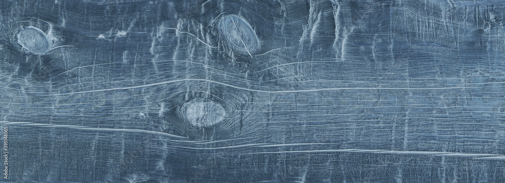 Rustic cool blue wood background with cracks and grain texture Rustic cool blue wood background with cracks and grain texture