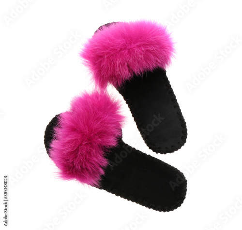 Pair of soft open toe slippers with pink fur on white background, top view