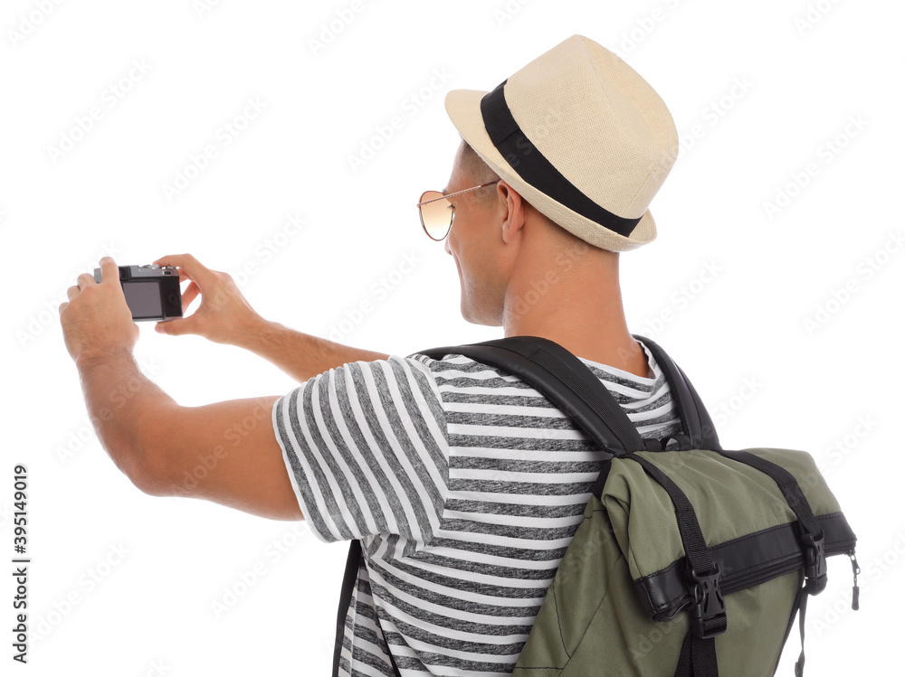 Man with straw hat taking picture on white background. Summer travel Man with straw hat taking picture on white background. Summer travel