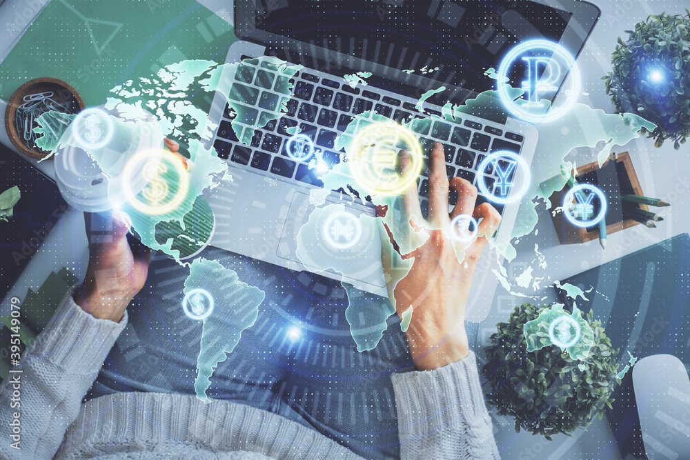 Double exposure of woman hands working on computer and forex chart hologram drawing. Top View. Financial analysis concept. Double exposure of woman hands working on computer and forex chart hologram drawing. Top View. Financial analysis concept.