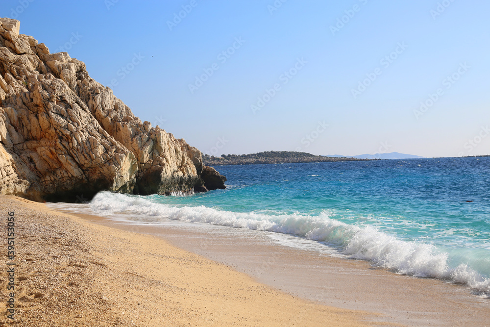 Beautiful beach Kaputash with blue transparent water in Kalkan Turkey. Holidays concept. 