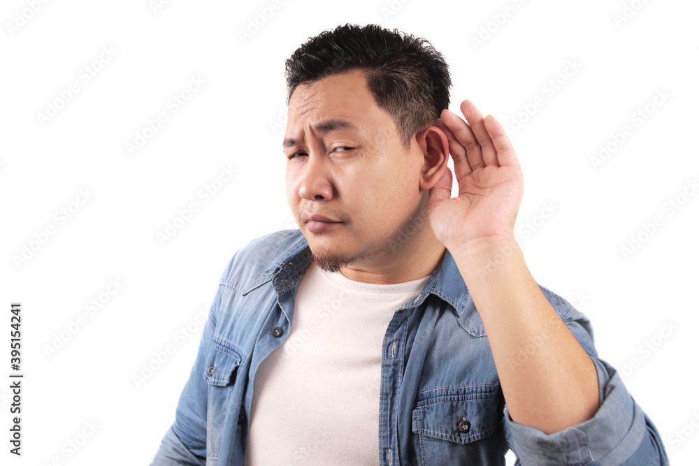 Young asian man listen whispers with funny face. Curious. Intently listen  in on juicy gossip. Conversation news, privacy violation Stock Photo |  Adobe Stock