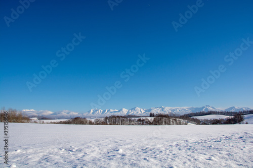雪山と青空　十勝岳連邦  © kinpouge