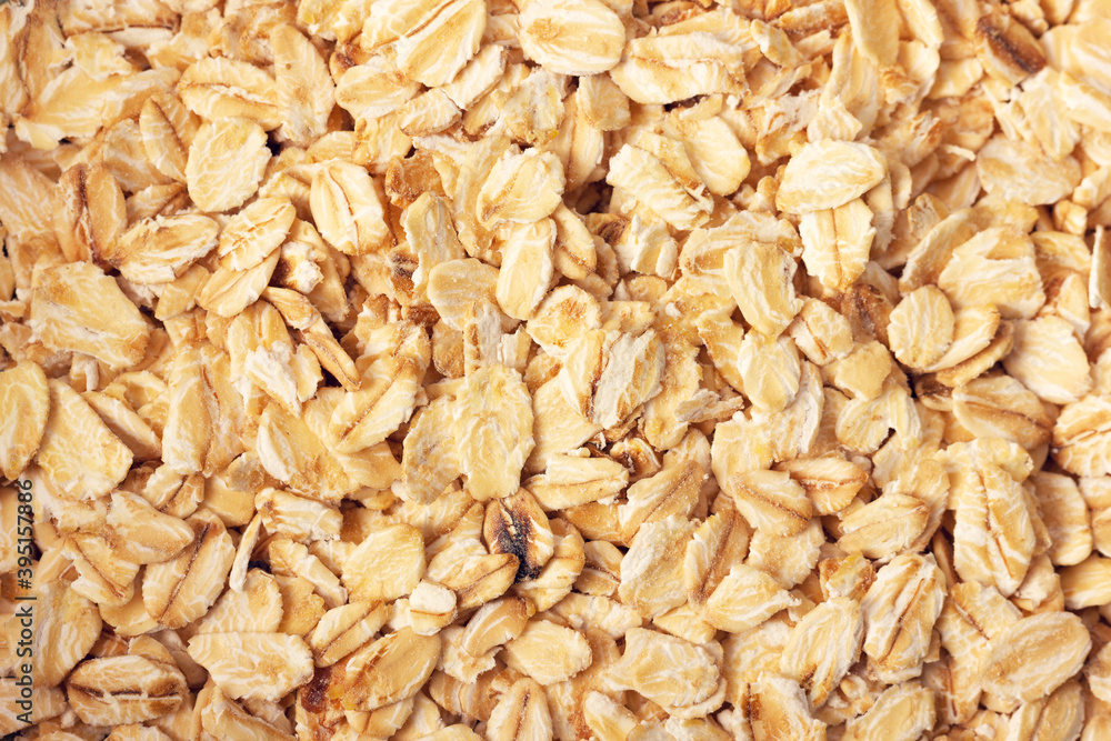 Beautiful rolled oats background. Close up view. Healthy breakfast concept. Beautiful rolled oats background. Close up view. Healthy breakfast concept.