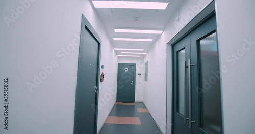 POV Smooth Wide Angle Shot Through Residential Hallway Corridor