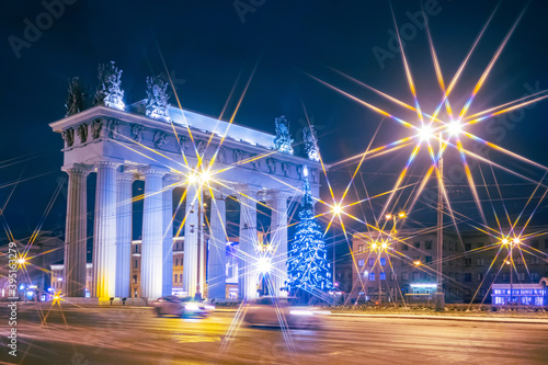 St. Petersburg Christmas lights. New year in Russia. Christmas in the Russian Federation. Christmas tree near the Moscow gate in St. Petersburg. Festive evening in Saint-Petersburg. photo