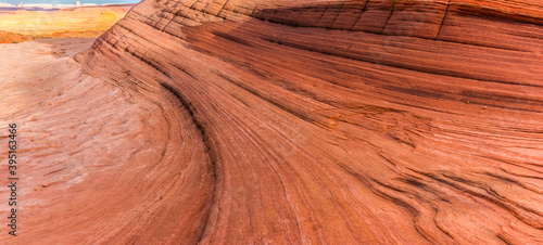 Swirling Patterns on Slick Rock at The New Wave, Glen Canyon National Recreation Area, Arizona, USA