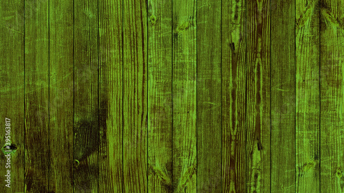 Top view of green background wooden planks board texture.