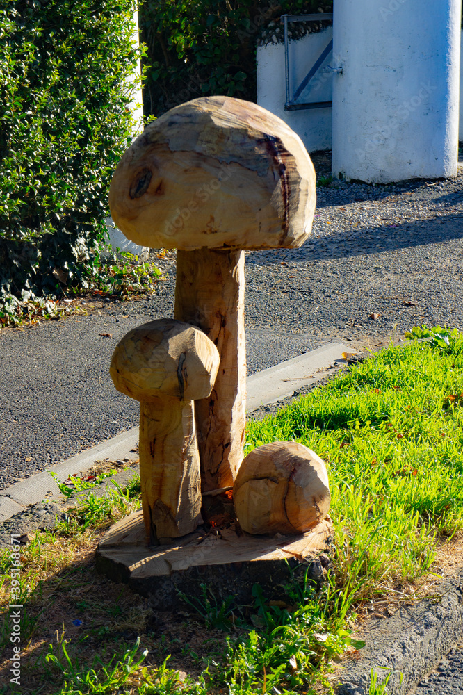 wood sculpture of mushrooms