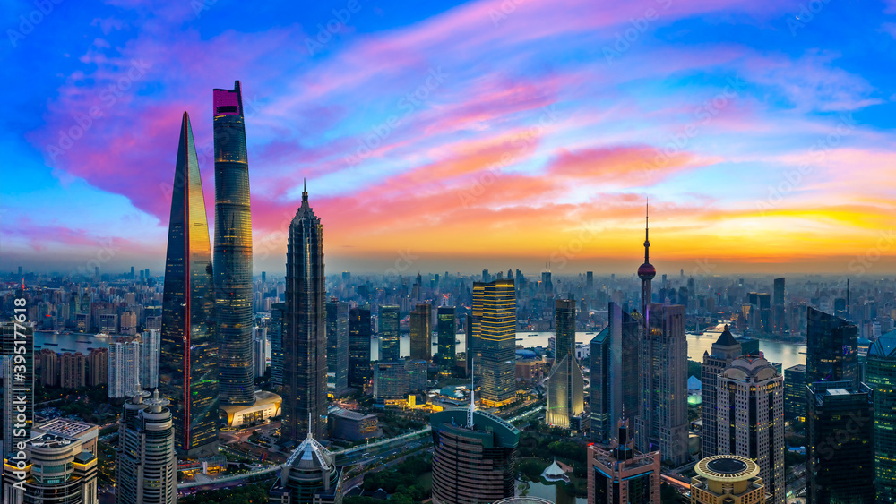 Fototapeta premium Aerial view of Shanghai skyline and cityscape at sunset,China.