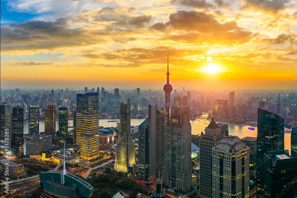 Fototapeta premium Aerial view of Shanghai skyline and cityscape at sunset,China.