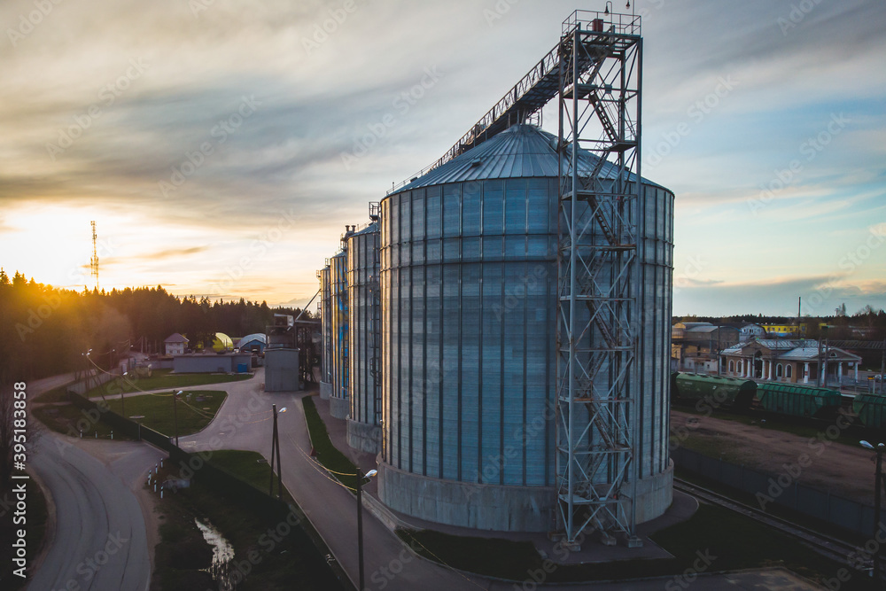 Obraz premium Aerial top view of Grain Elevator Silos, Granary of a feed mill built of modern metal structures