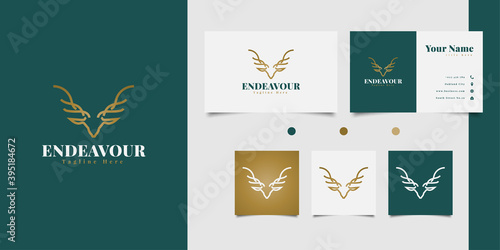 Elegant deer head logo design with line art concept in golden gradient