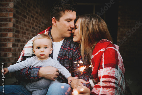 Family Celebrating at Home with Sparklers