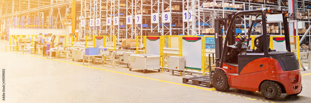 The warehouse full of goods, boxes and shelves. Industrial background container plant manufacturing manufacture production paperboard business deal
