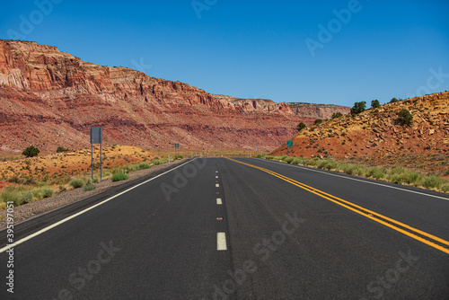 Empty asphalt road. Road in mountains, Travel concept and American roadtrip. Empty asphalt highway.