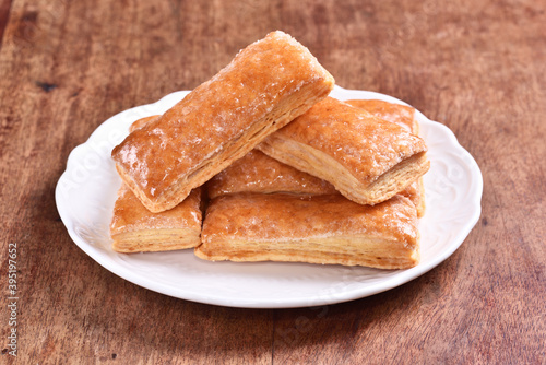  Multi-layered honey biscuit on the white plate   