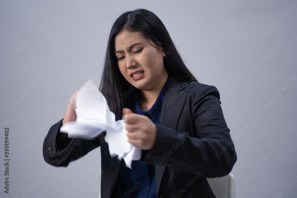 Life style portrait of a young Asian business woman in various poses, studio shot, business concept, isolated background Life style portrait of a young Asian business woman in various poses, studio shot, business concept, isolated background