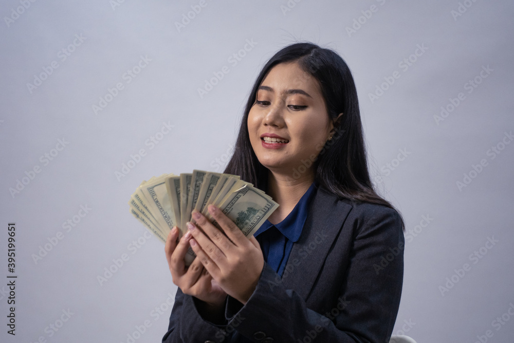 Life style portrait of a young Asian business woman in various poses, studio shot, business concept, isolated background Life style portrait of a young Asian business woman in various poses, studio shot, business concept, isolated background