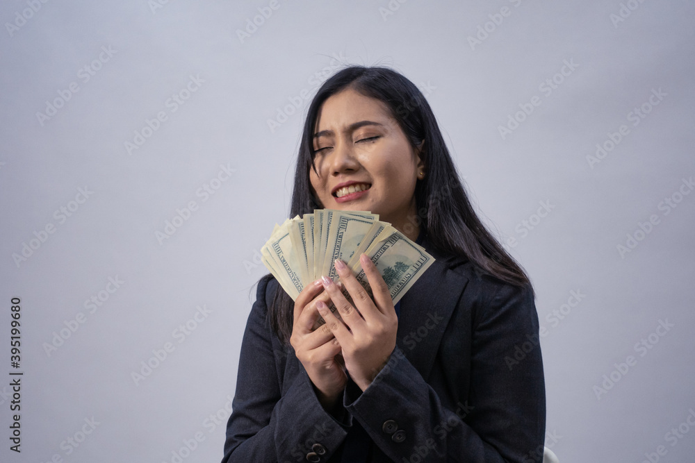 Life style portrait of a young Asian business woman in various poses, studio shot, business concept, isolated background Life style portrait of a young Asian business woman in various poses, studio shot, business concept, isolated background