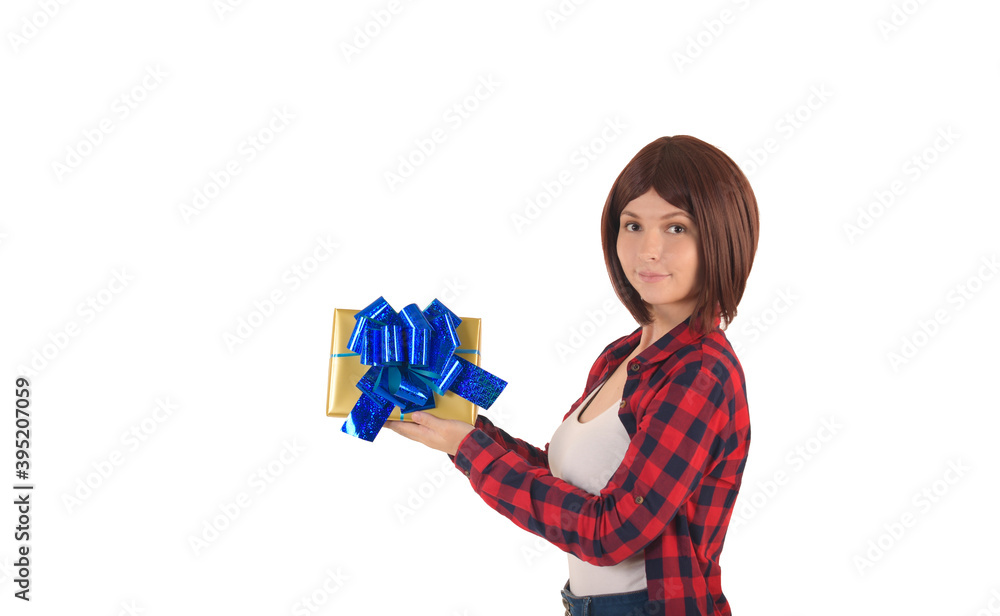 Happy young girl with short hair in red checked shirt smiles, hold gift in a yellow package with a blue ribbon, isolated on white background: space for text Happy young girl with short hair in red checked shirt smiles, hold gift in a yellow package with a blue ribbon, isolated on white background: space for text