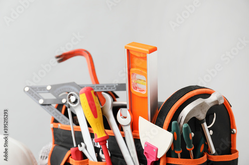 Construction tools on grey background