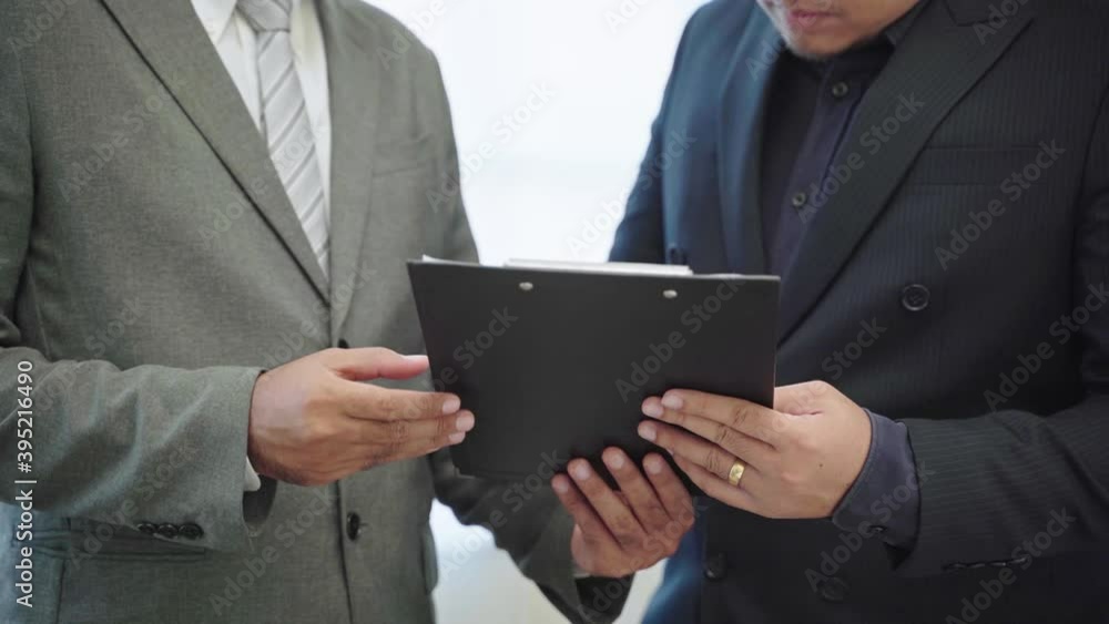 Two businessmen agree to enter into a commercial contract between companies. He stood for a good deal and agreed by shaking hands.4K Resolution.
Two businessmen agree to enter into a commercial contract between companies. He stood for a good deal and agreed by shaking hands.4K Resolution.