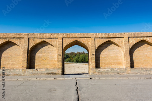 Archs of Allahverdi Khan Bridge, also named Si-o-seh pol bridge, across the Zayanderud river, in Isfahan, Iran, a famous historic building in Persian History
