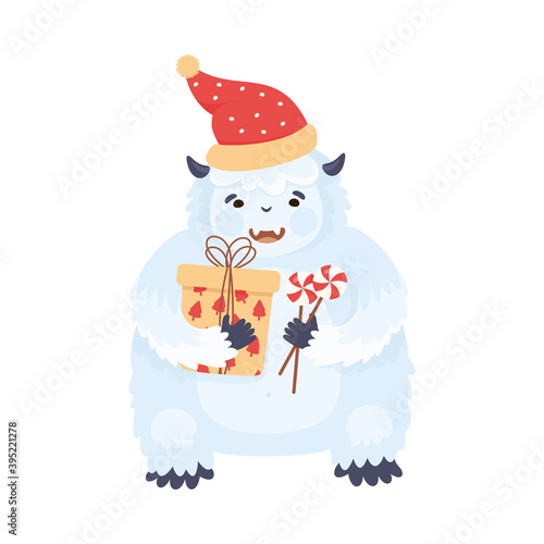 Abominable or Yeti as New Year Character in Warm Hat Holding Gift Box and Candy Vector Illustration