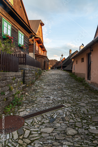 Horni Bastra street with wooden houses in Stramberk town in Czech republic photo