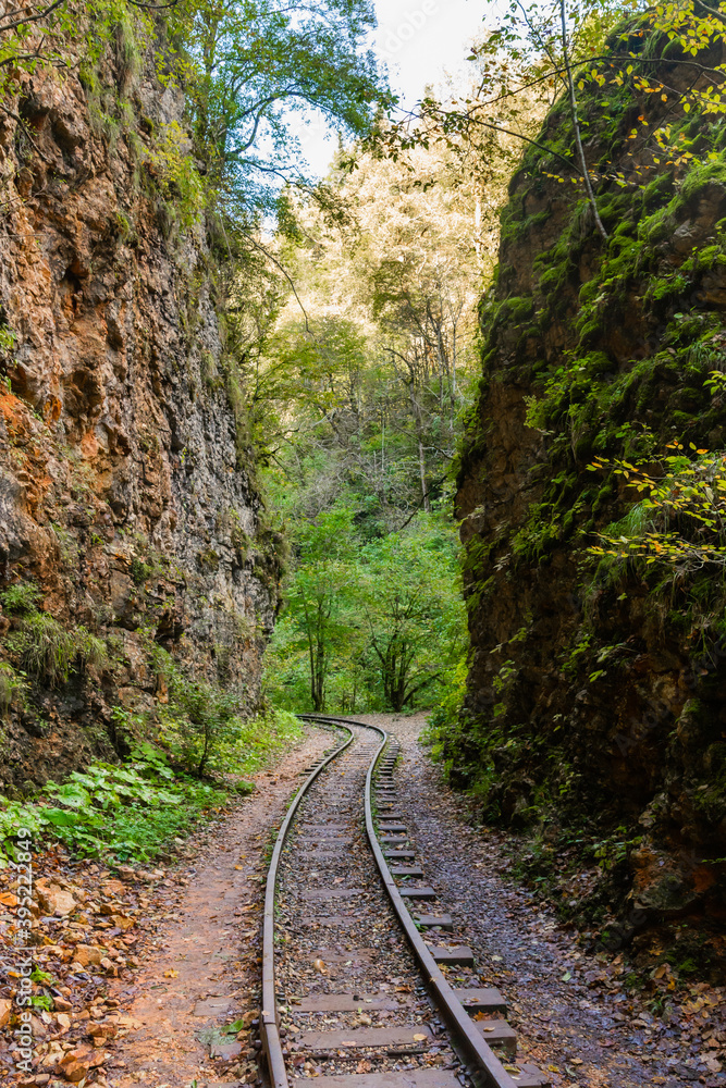 Fototapeta premium Old narrow gauge railway in mountain region.