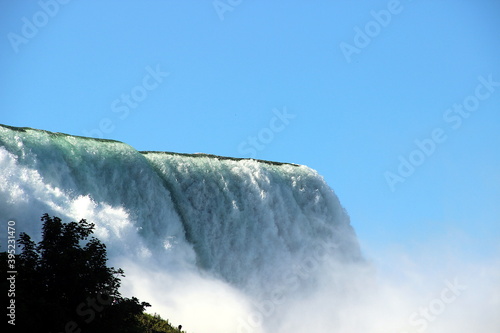 Niagara Falls from the American part, a huge stream of clear water, the power of nature in its incarnation.