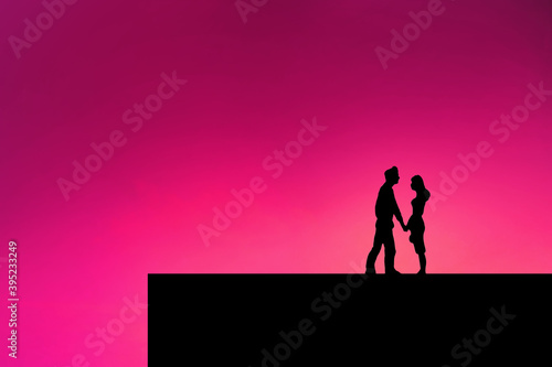 man and woman on pink background , couple in love , valentine concept