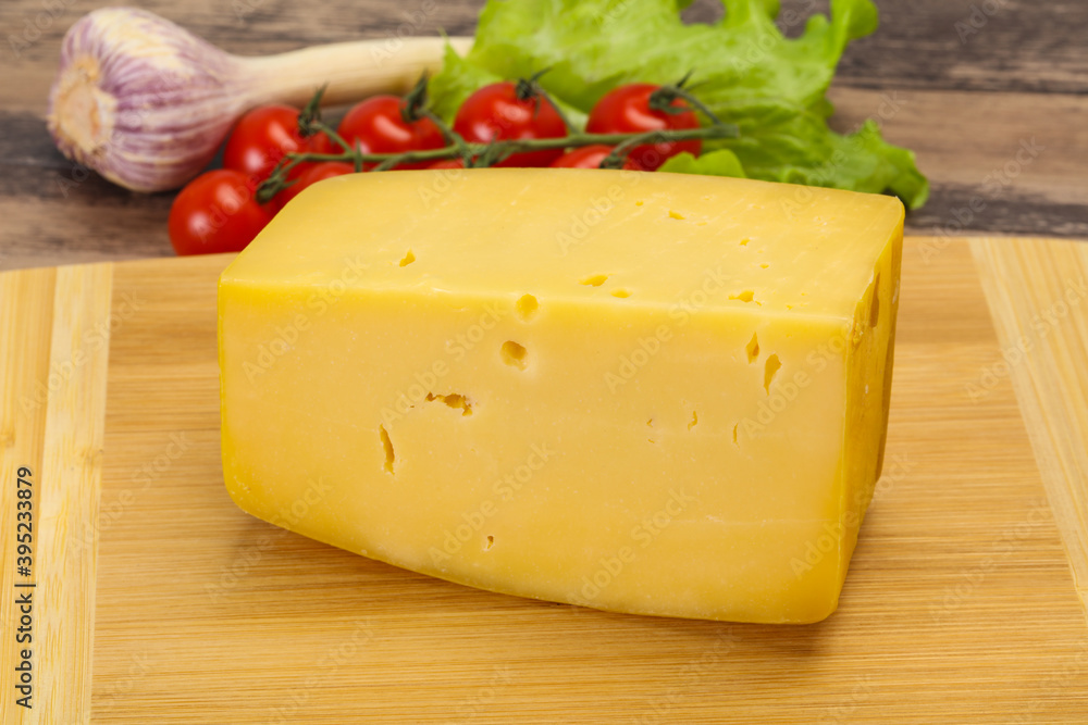 Hard yellow tasty cheese brick Hard yellow tasty cheese brick