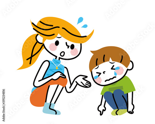 泣いている子供を心配するお母さん