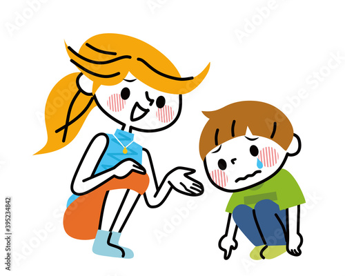 泣いている子供を慰めるお母さん