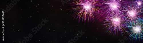 Colorful fireworks - New Years Eve background banner with copy space