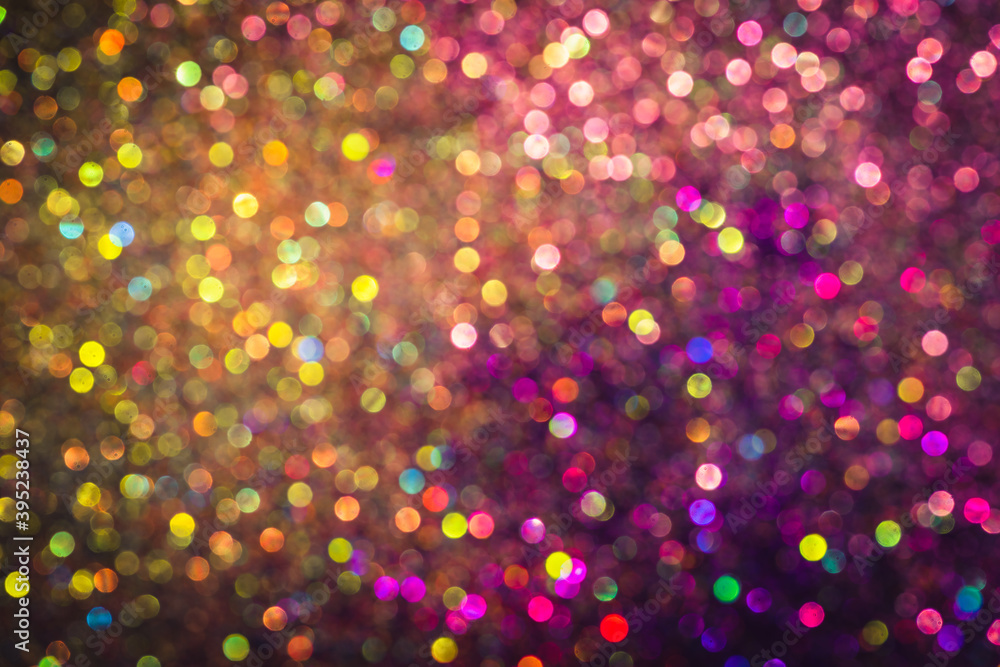bokeh effect glitter colorful blurred abstract background for birthday, anniversary, wedding, new year eve or Christmas