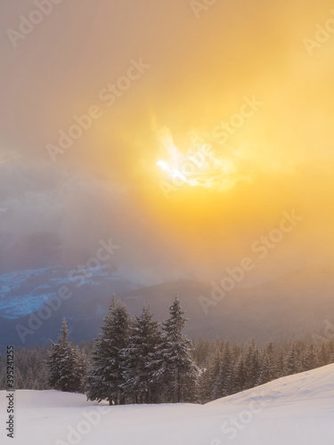 Sunrise over the mountain winter landscape.