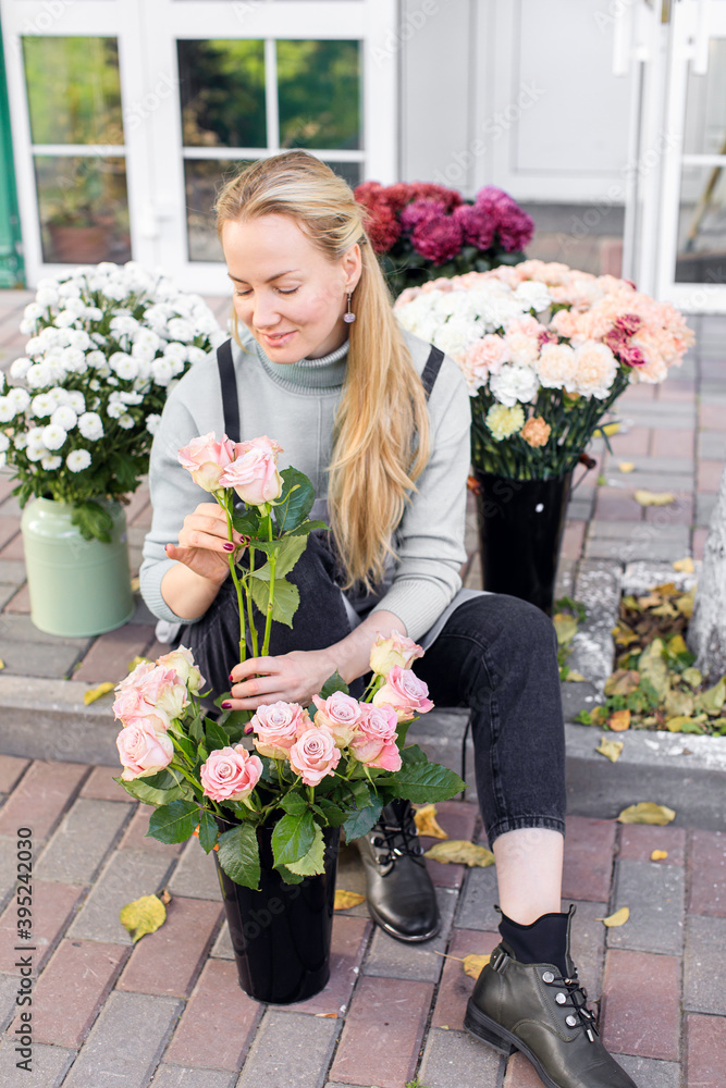 Fototapeta premium Floristry concept. bouquet of beautiful flowers. Spring colors. the work of the florist at a flower shop