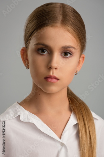 portrait of a beautiful blonde teen girl
