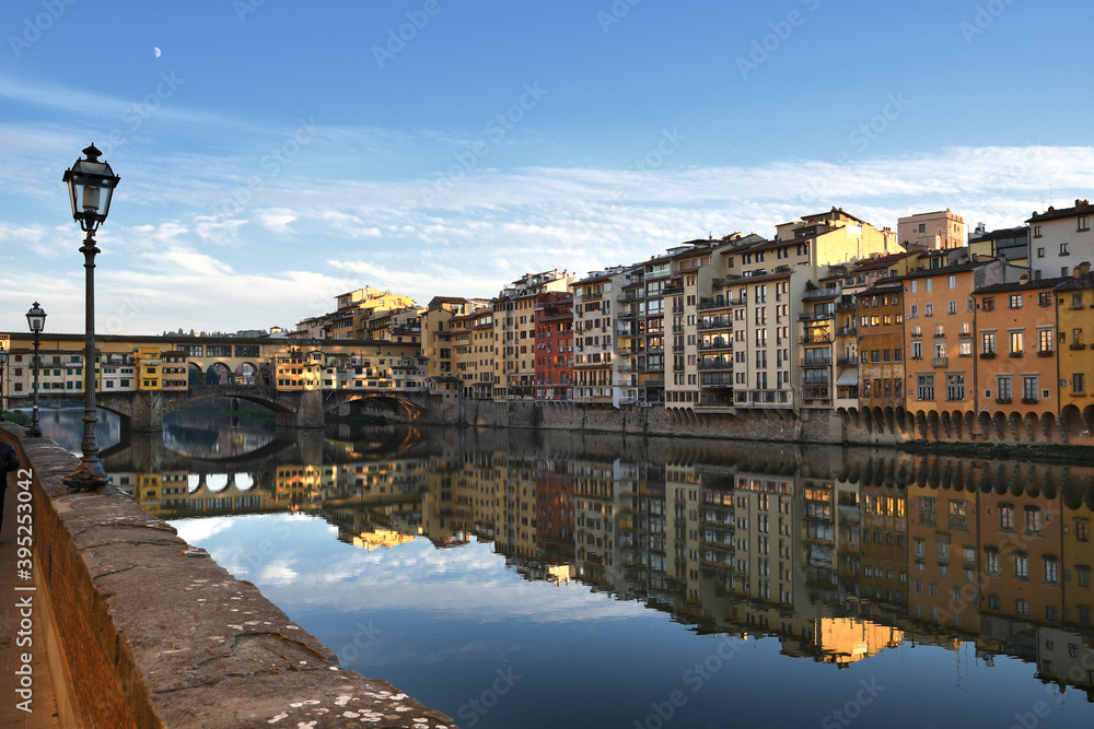 Florence, November 2020: The famous old bridge over Arno river in Florence, Italy.