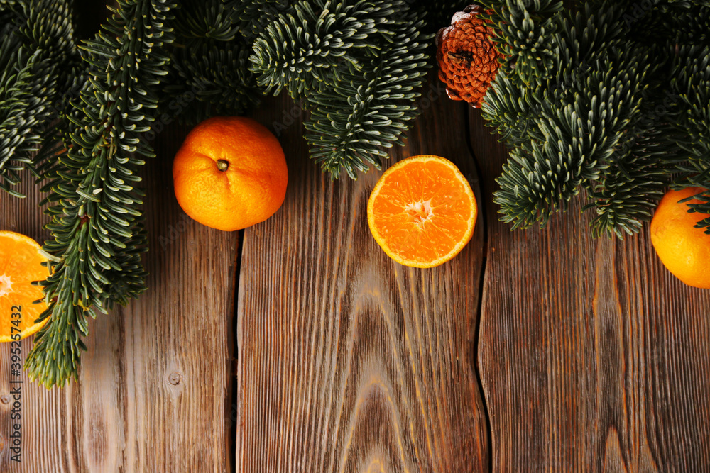 christmas background. christmas tree and tangerin or mandarin on wooden table. concept of new year top view christmas background. christmas tree and tangerin or mandarin on wooden table. concept of new year top view