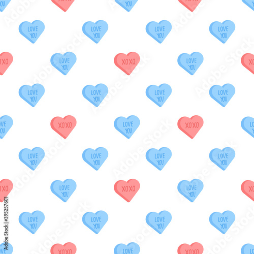 Cute vector seamless pattern with conversation hearts for Valentine day. Red and blue sweethearts background for February, 14 holiday.