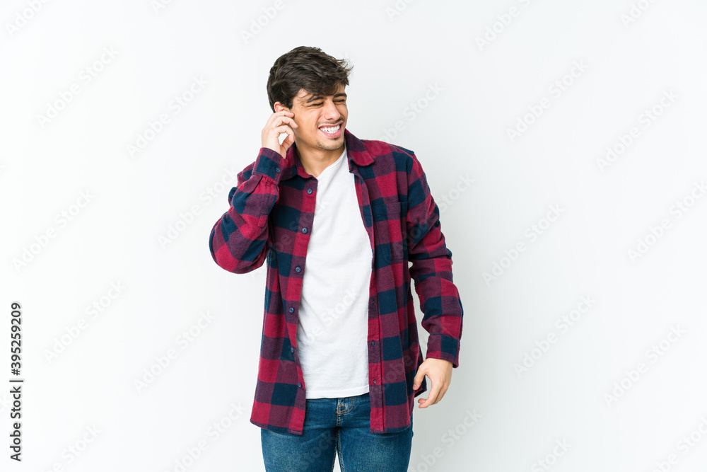 Young cool man covering ears with hands. Young cool man covering ears with hands.