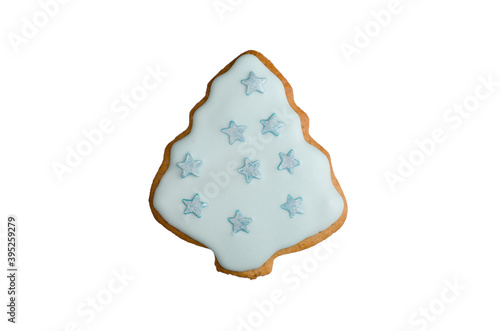 christmas tree honey gingerbread cookies homemade decorated with blue icing isolated on white  food background