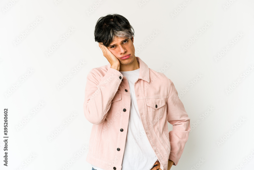 Young skinny hispanic man who is bored, fatigued and need a relax day. Young skinny hispanic man who is bored, fatigued and need a relax day.