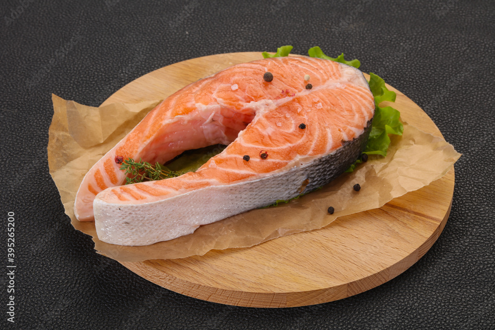 Raw salmon steak - ready for grill Raw salmon steak - ready for grill