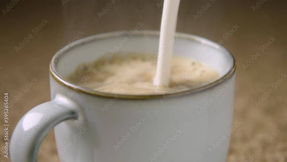 150fps SLOW MOTION a delicious steaming cappuccino being made 150fps SLOW MOTION a delicious steaming cappuccino being made