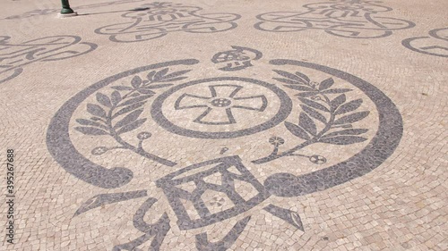 typical portuguese cobblestone pavement in Lisbon Portugal 4k